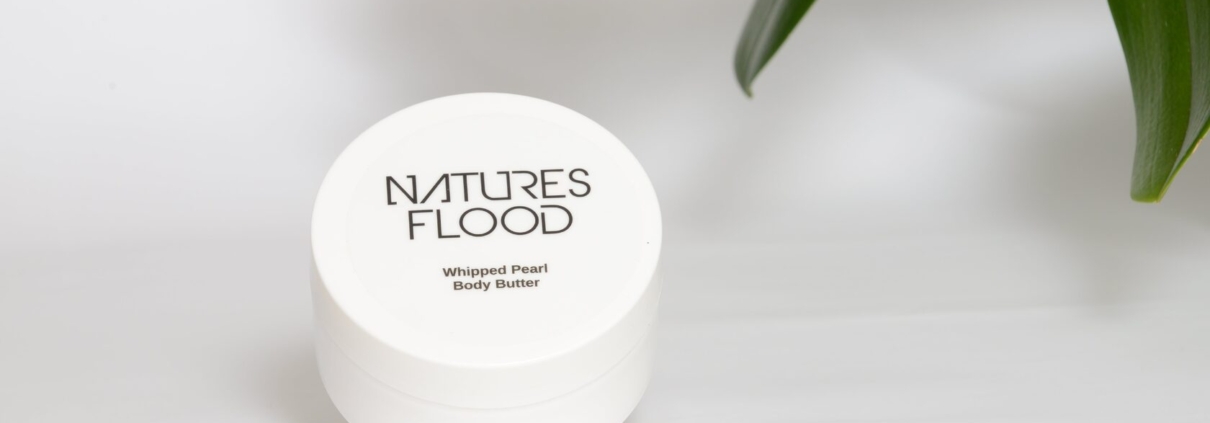 Natures Flood Whipped Pearl Body Butter with orchid flowers